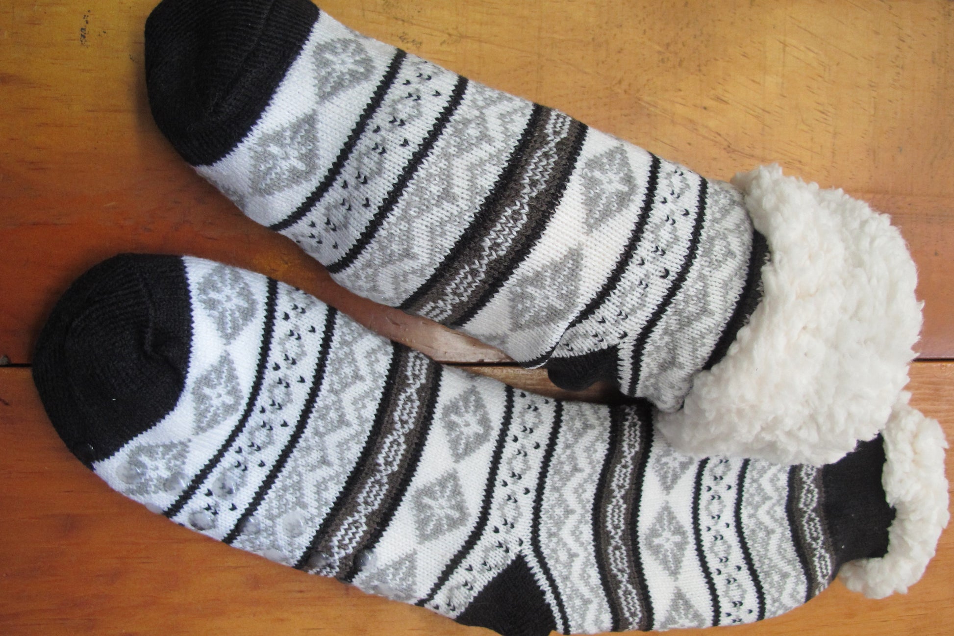 Sherpa-Lined Cabin Socks black, white, grey color.  Snowflake/fairisle design