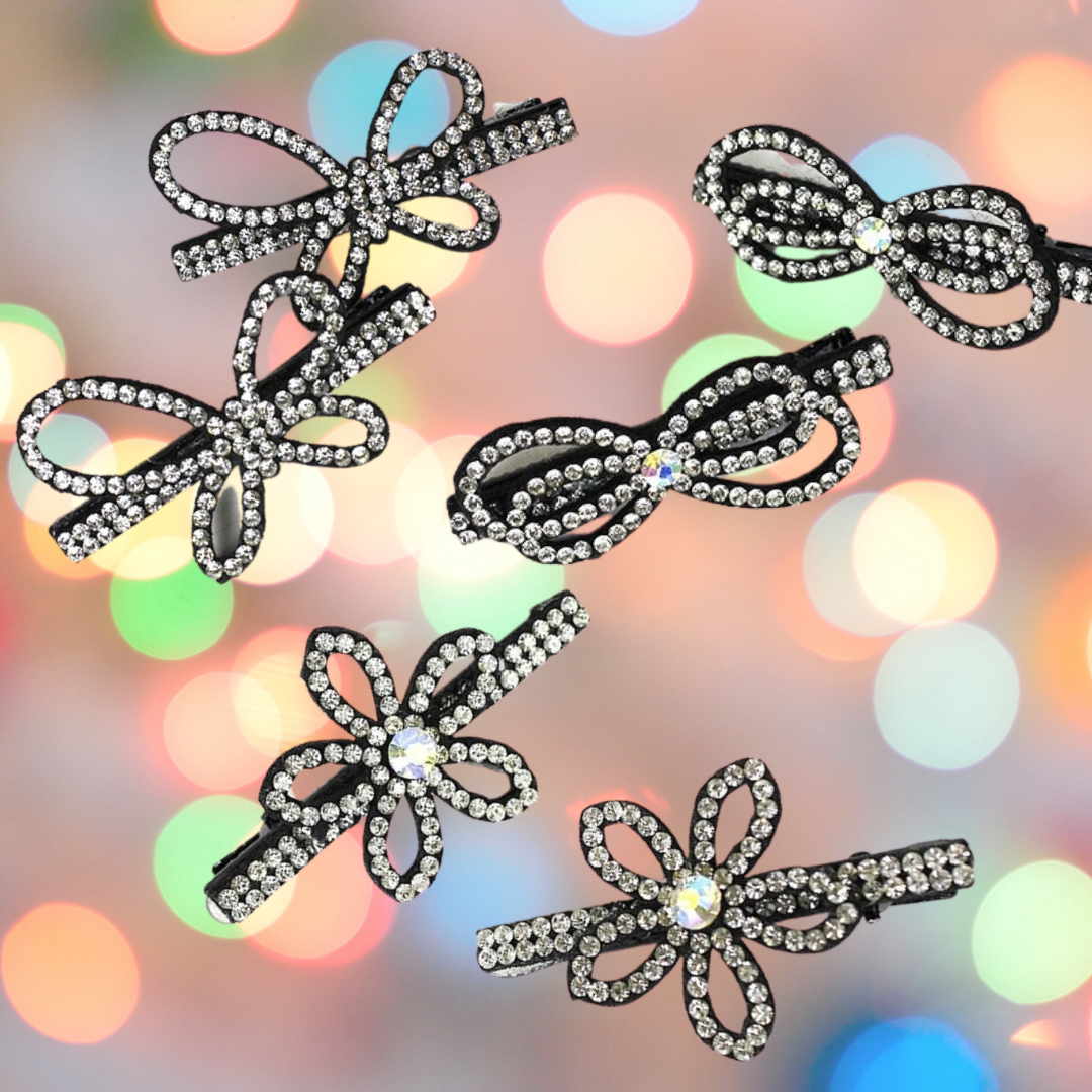 Sparkly Soft-Slide Hair Clips - SET OF 3 - Tumble into Love.  Image shows one set of butterfly shaped clips;  Bow style shaped clips; and Flower style shaped clips.  All are silver rhinestone color