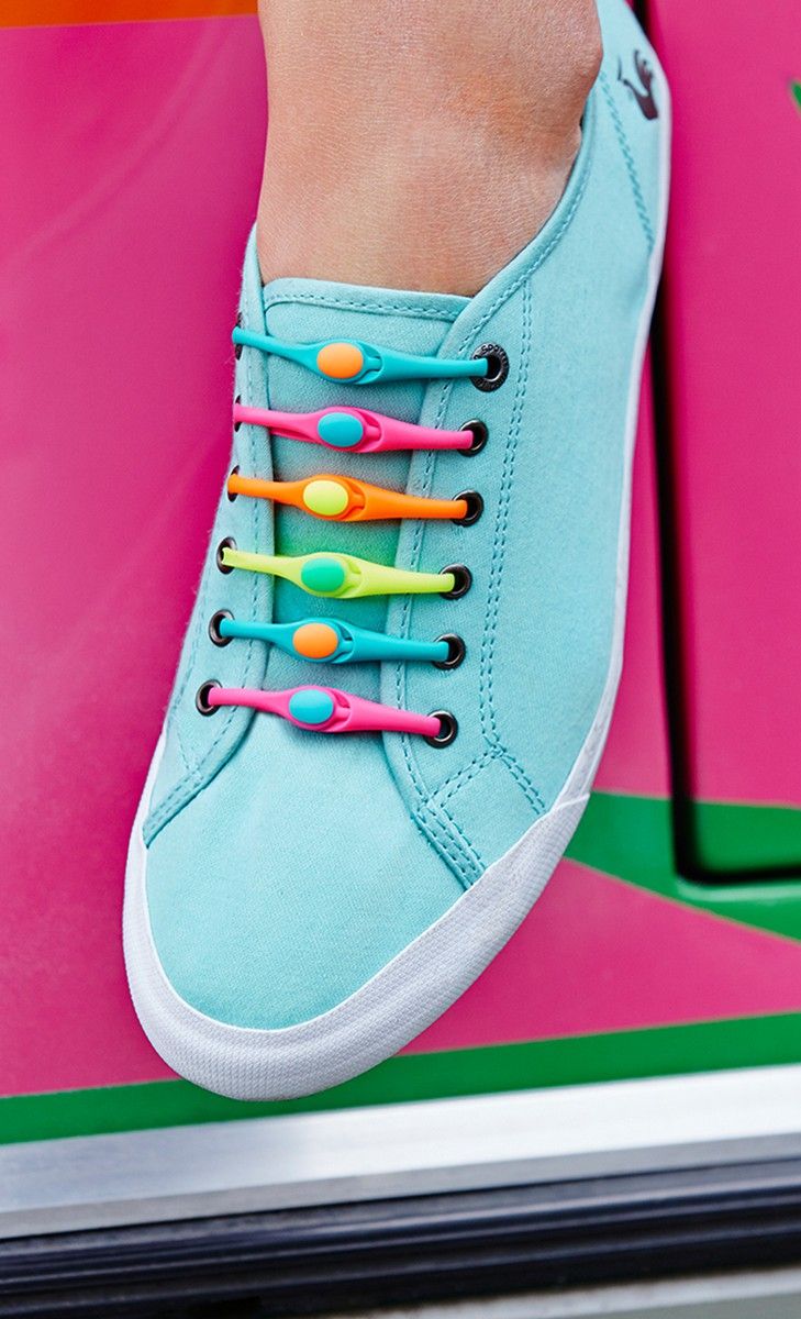 No-Touch Laces! - Tumble into Love.  Image shows sneakers with the rainbow no-touch laces. Each lace is a different color. Image shows orange, yellow, green, purple and pink.