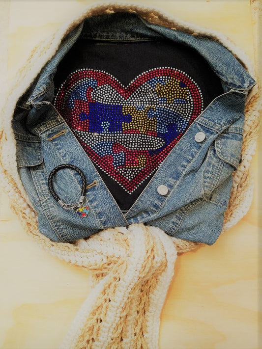Embrace Difference Tees -Superhero Heart - Tumble into LoveShort sleeved black tee shirt with a large heart.  Heart has an "S" for Superhero and is made up of Red, Blue, yellow puzzle pieces,  Entire heart design is made of colorful rhinestones.